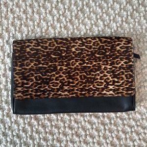 Leopard and black leather clutch